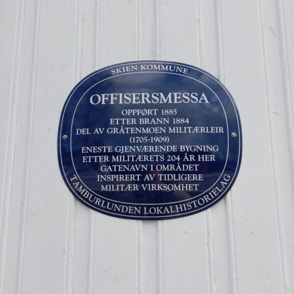 Blått skilt av offisermessa