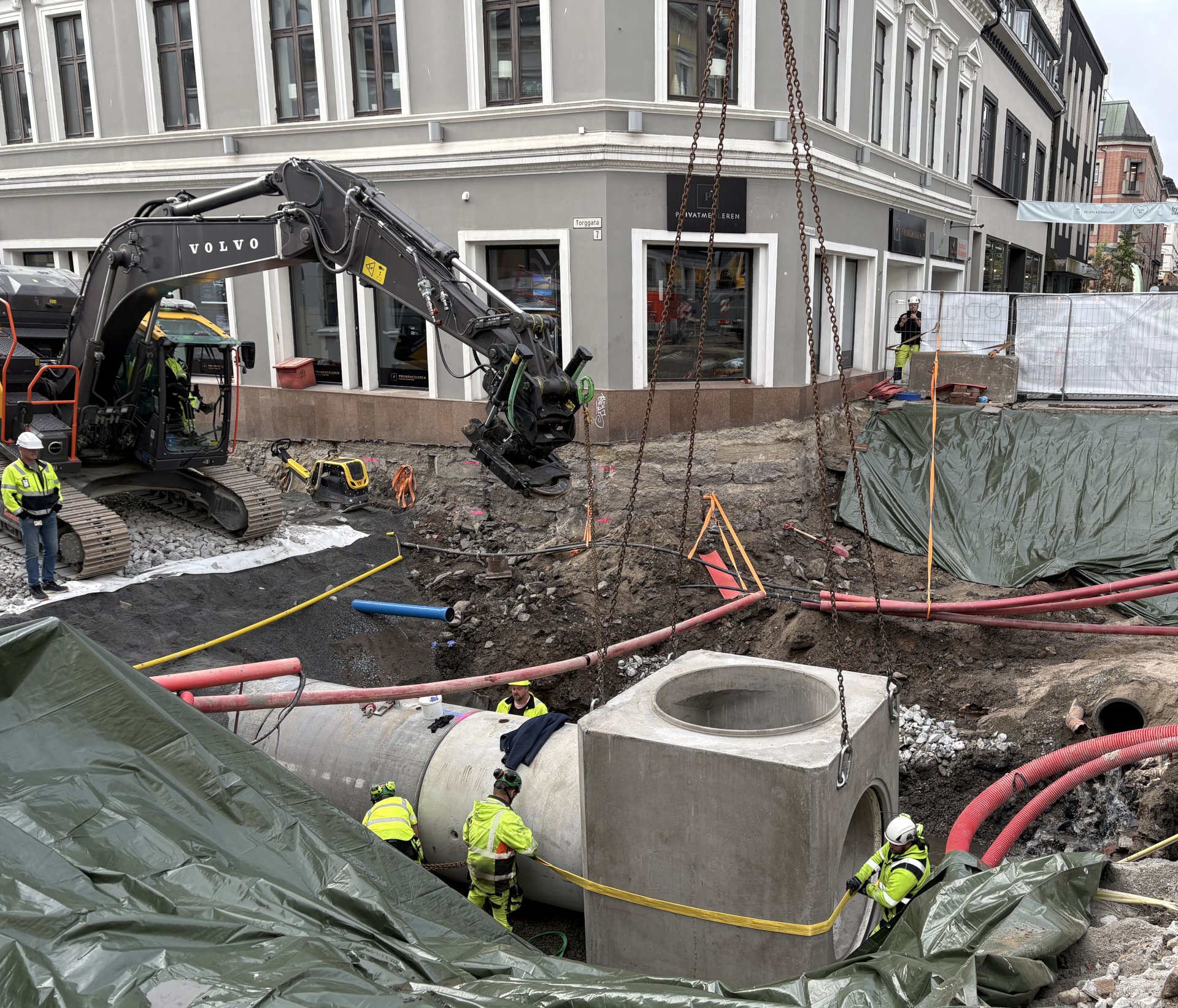 Tung milepæl i Torggata 